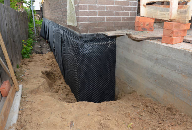 Happy homeowners after waterproofing job in Ottawa